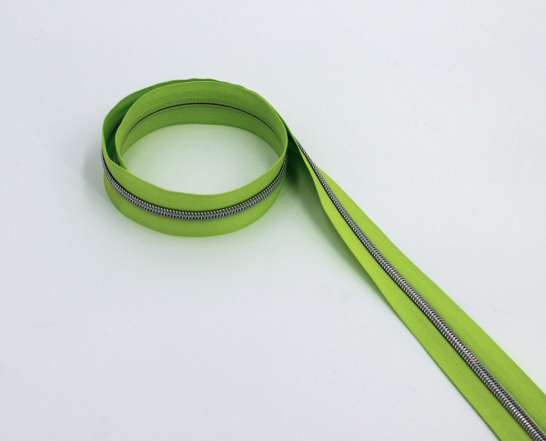 Endlosreißverschluss metallisiert frühlingsgrün/ silber (1m)